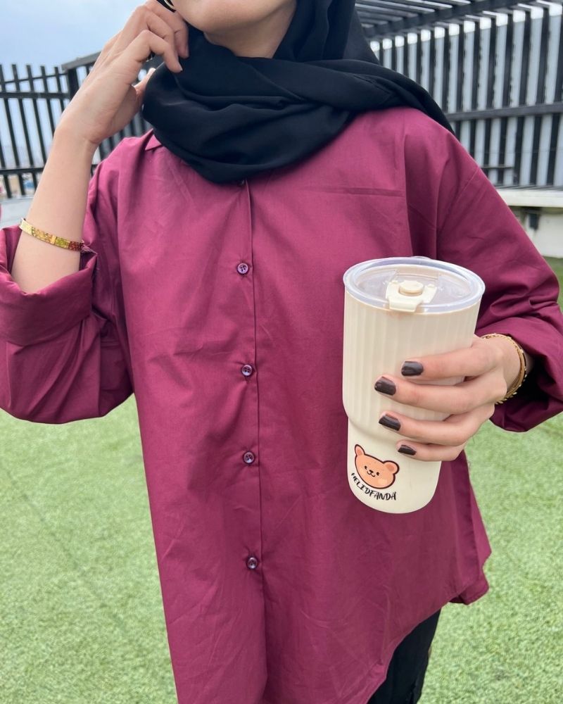 Customer wearing Maroon Puce shirt